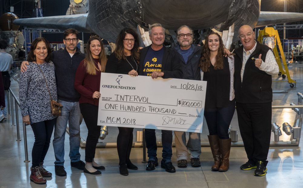 Dan Palmier of ONE Foundation presents donation to Intervol